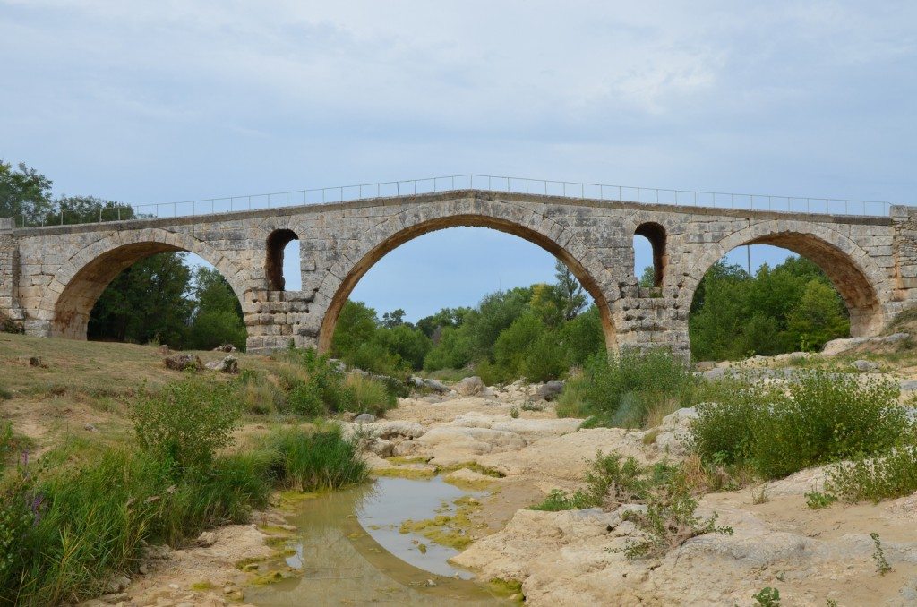 The Pont Julien, a 3 BCE Roman arch bridge over the Calavon river built on the Via Domitia © Carole Raddato